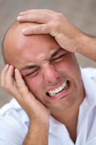 man grimacing