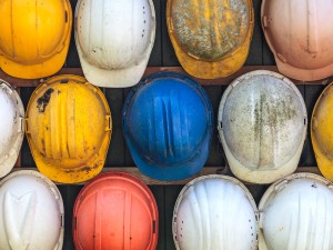 old and worn hard hats